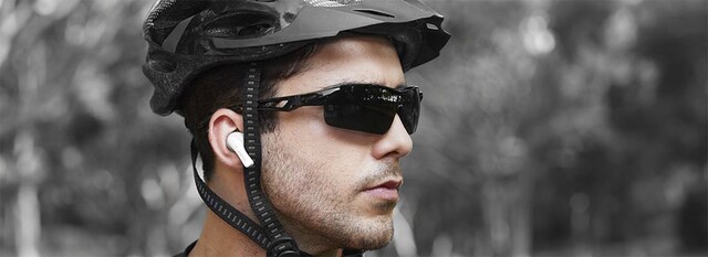 Man wearing PaMu slide earbuds Man wearing PaMu slide earbuds