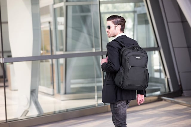 Man wearing backpack Man wearing backpack